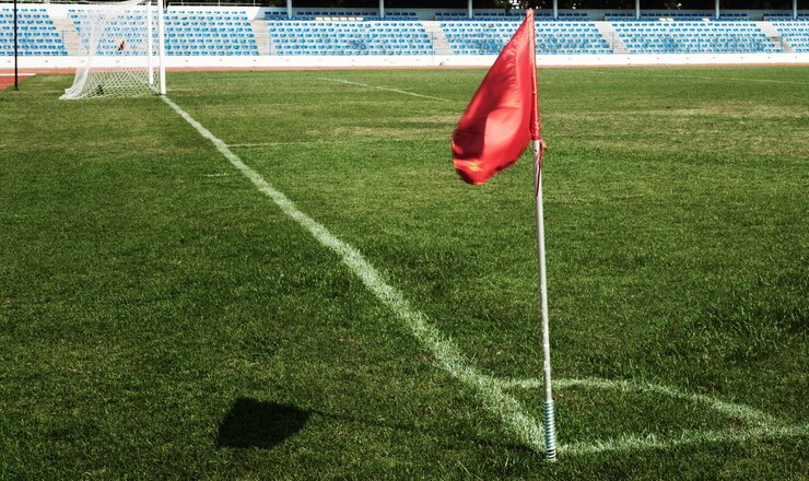 Local onde é realizada a cobrança do escanteio no futebol, no encontro entre a linha de fundo e a lateral - Foto Freepik