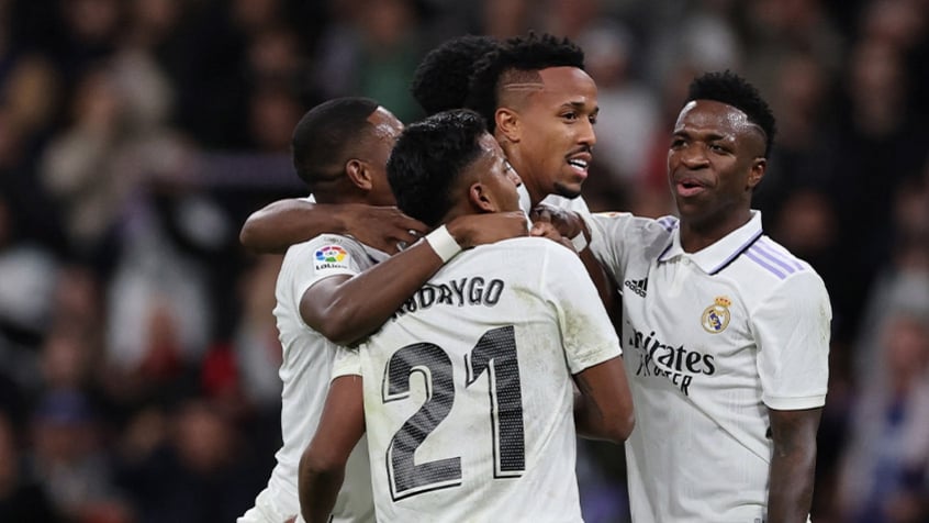 Vinícius Júnior, Rodrygo e Eder Militão - Foto: Pierre-Philippe Marcou / AFP