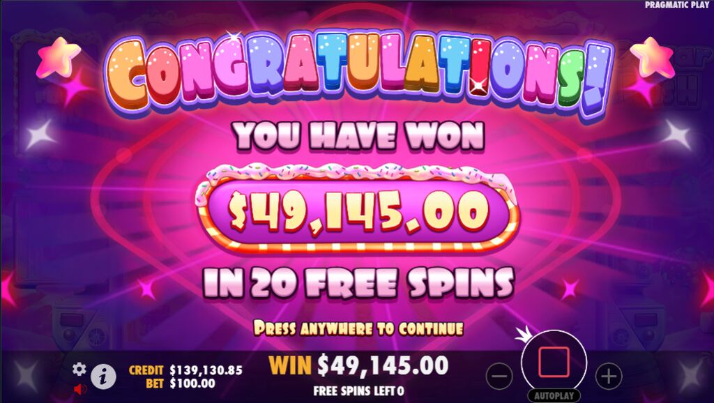 Tela de parabenização ao jogador por ganhar uma determinada quantia no jogo de slot Sugar Rush.