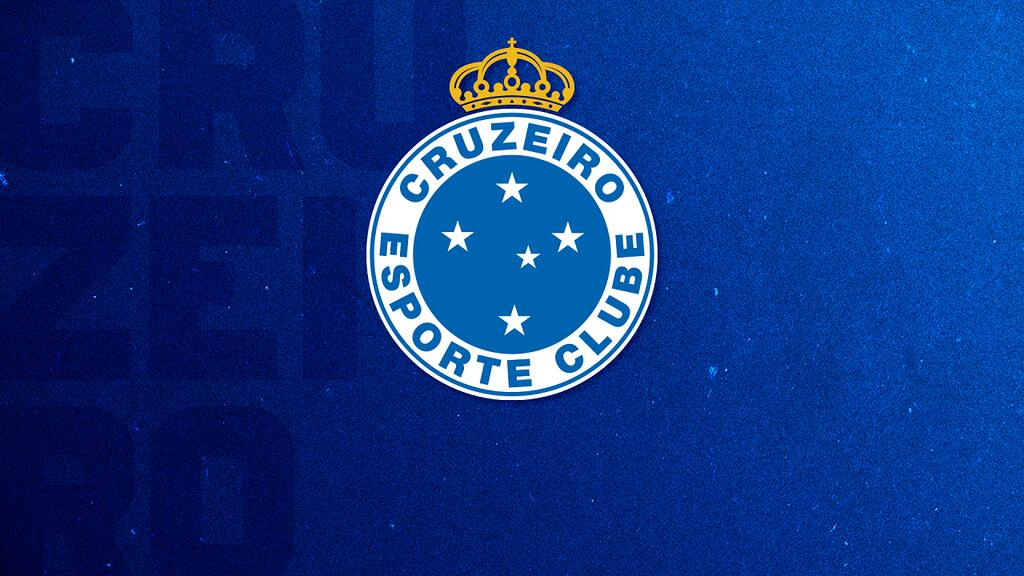 Escudo do Cruzeiro em meio a um fundo azul, mais escuro do lado esquerdo, e claro do lado direito.