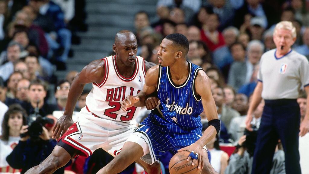 jogadores do orlando magic historia e do chicago bulls se disputando